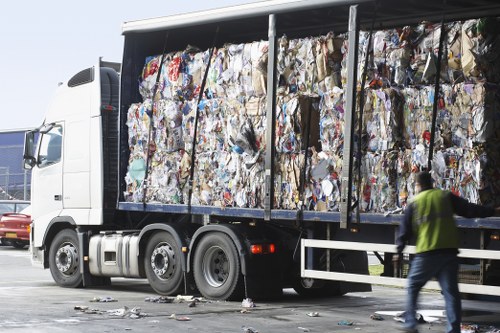 Waste collection trucks operating in Palmers Green streets